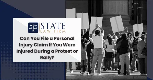 A group holding signs on personal injury claim