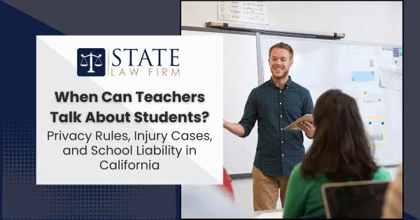 A man and woman collaborating in front of a whiteboard
