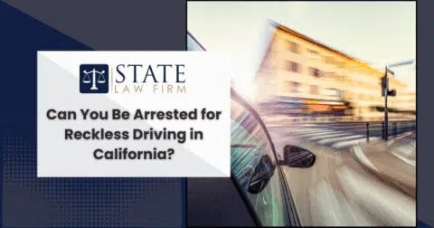 Car with state law firm advertisement on street