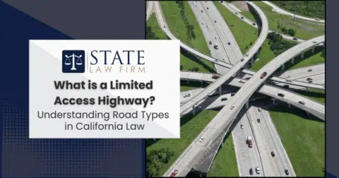 Highway intersection with state law firm sign