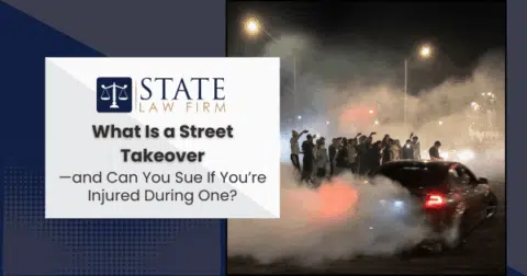 People gathered by a car with smoke