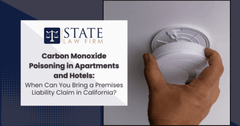 Person holding a smoke detector