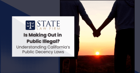 Two people holding hands at sunset