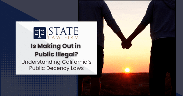 Two people holding hands at sunset